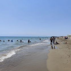 Фото Belek Public beach с бурая вода поверхностью